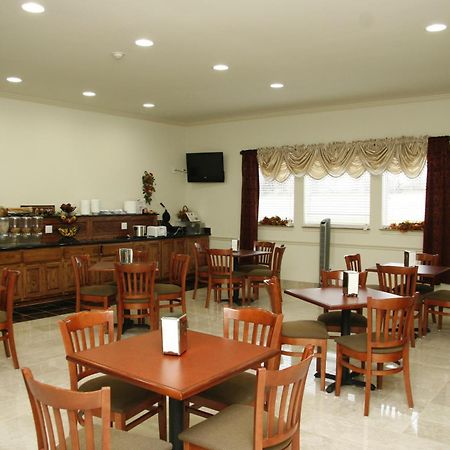Budget Host Inn And Suites Cameron Habitación foto